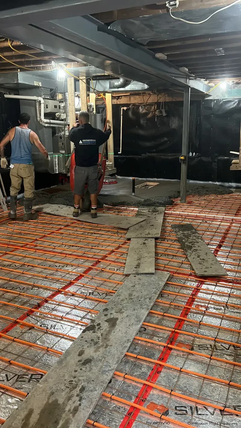 Radiant floor heating installation by Cornerstone Waterproofing