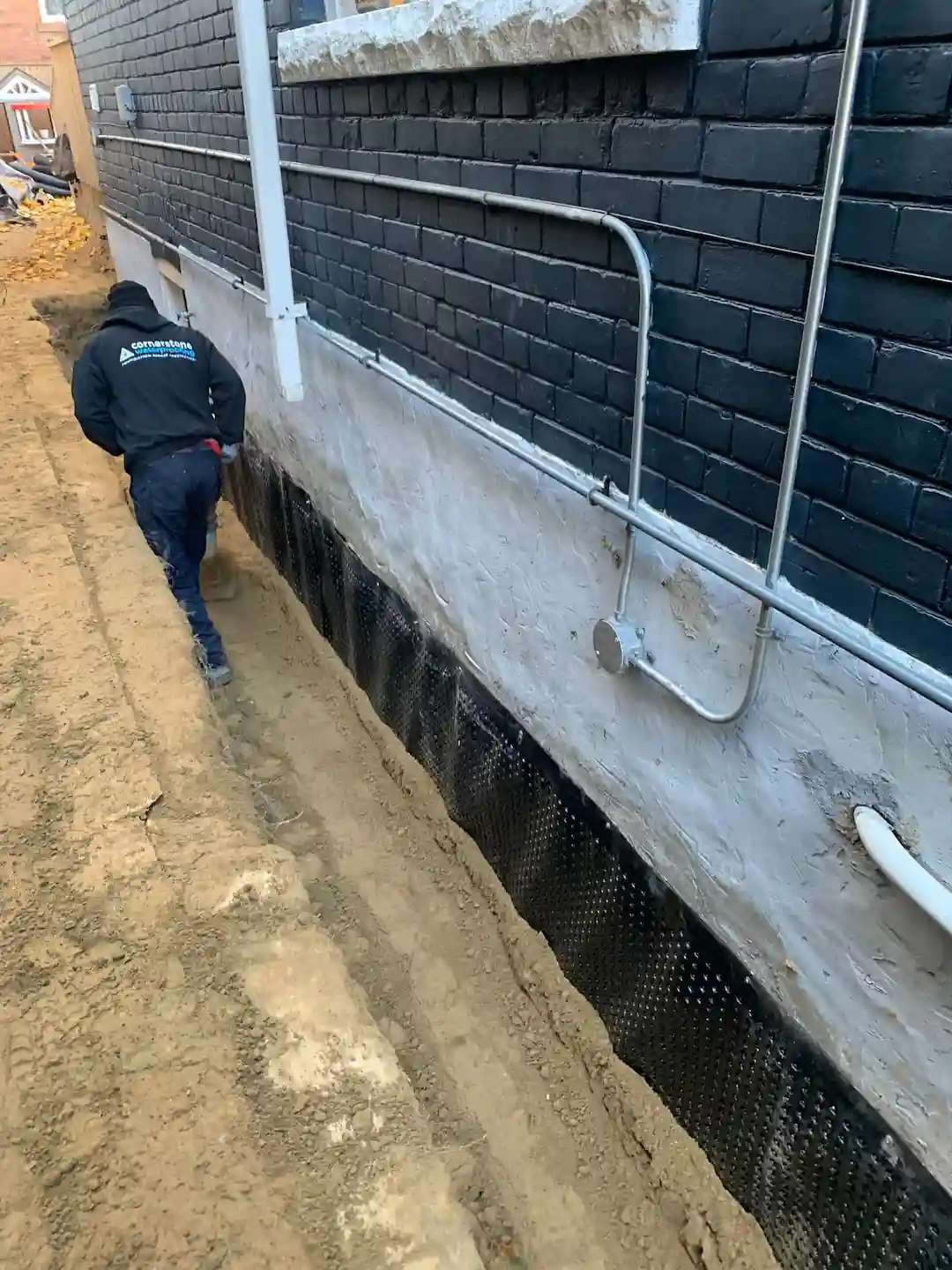 Cornerstone Waterproofing crew member on site in Toronto